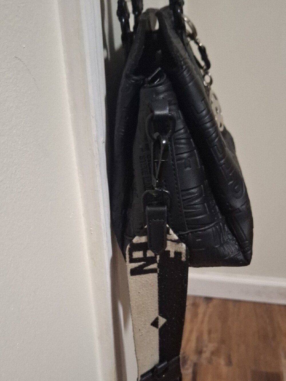 Steve Madden Black Embossed Logo Crossbody Satchel with Branded Guitar Strap - Picture 6 of 14